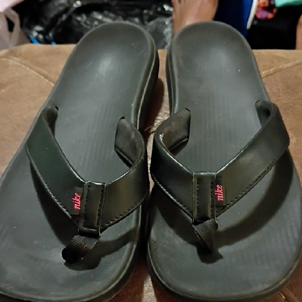 Nike Black Flip Flops with Pink Logo Accent